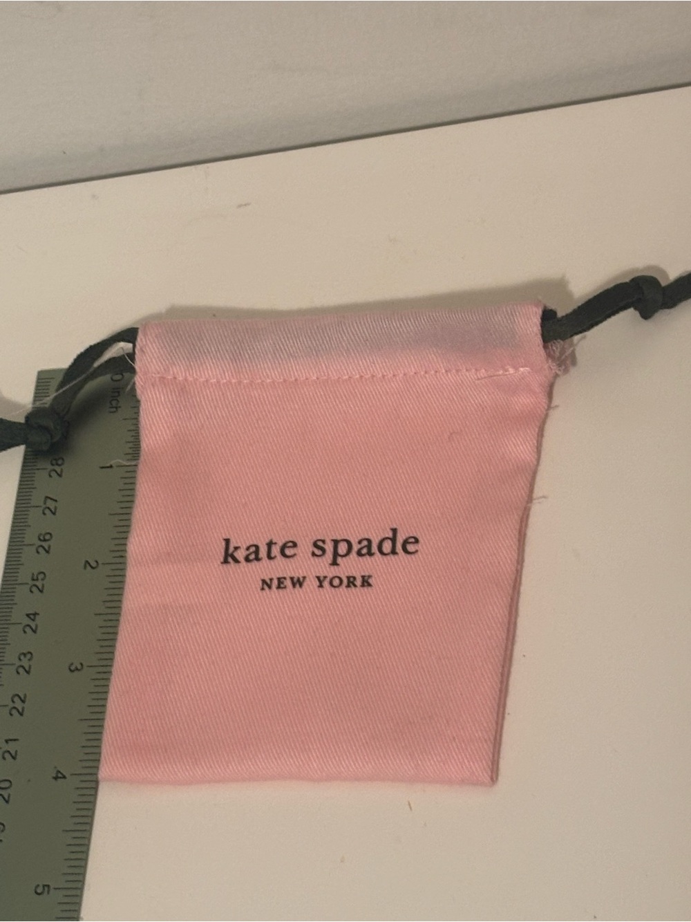 kate spade Pink Drawstring Jewelry Pouch with Black Cord